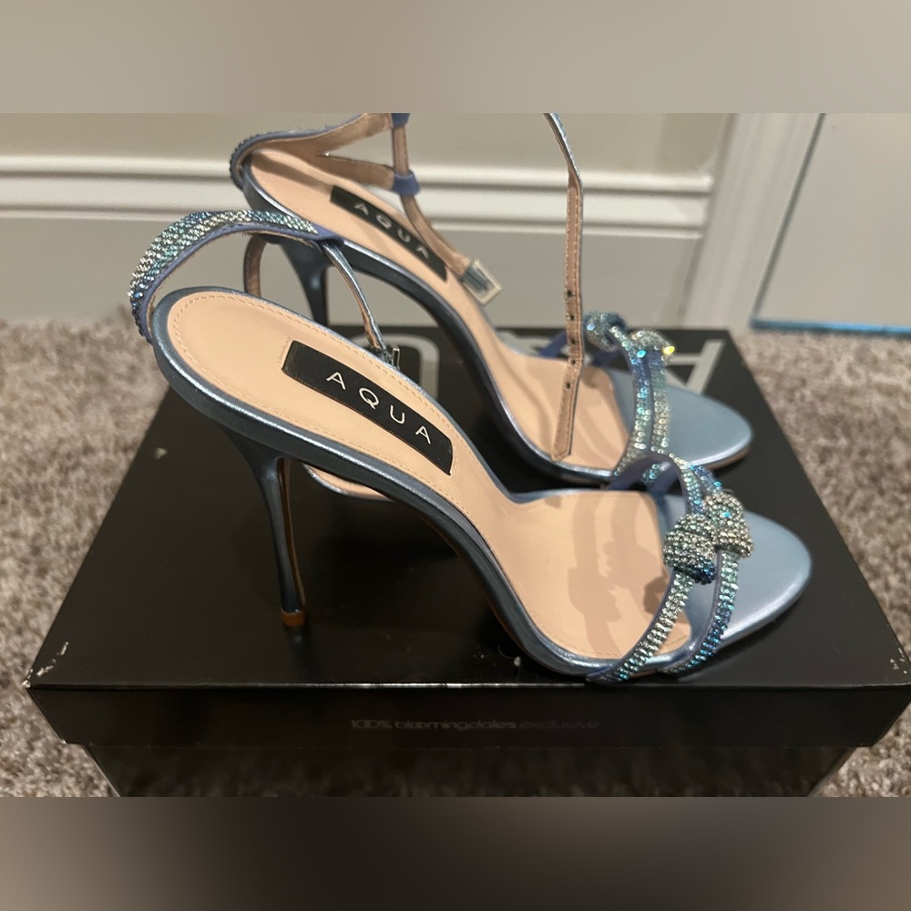 Like new Women’s size 9 Aqua Sandals . Worn only once .